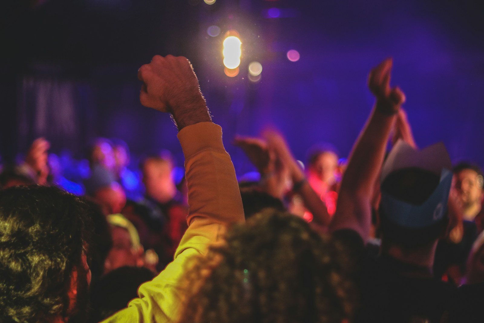 people partying under disco light